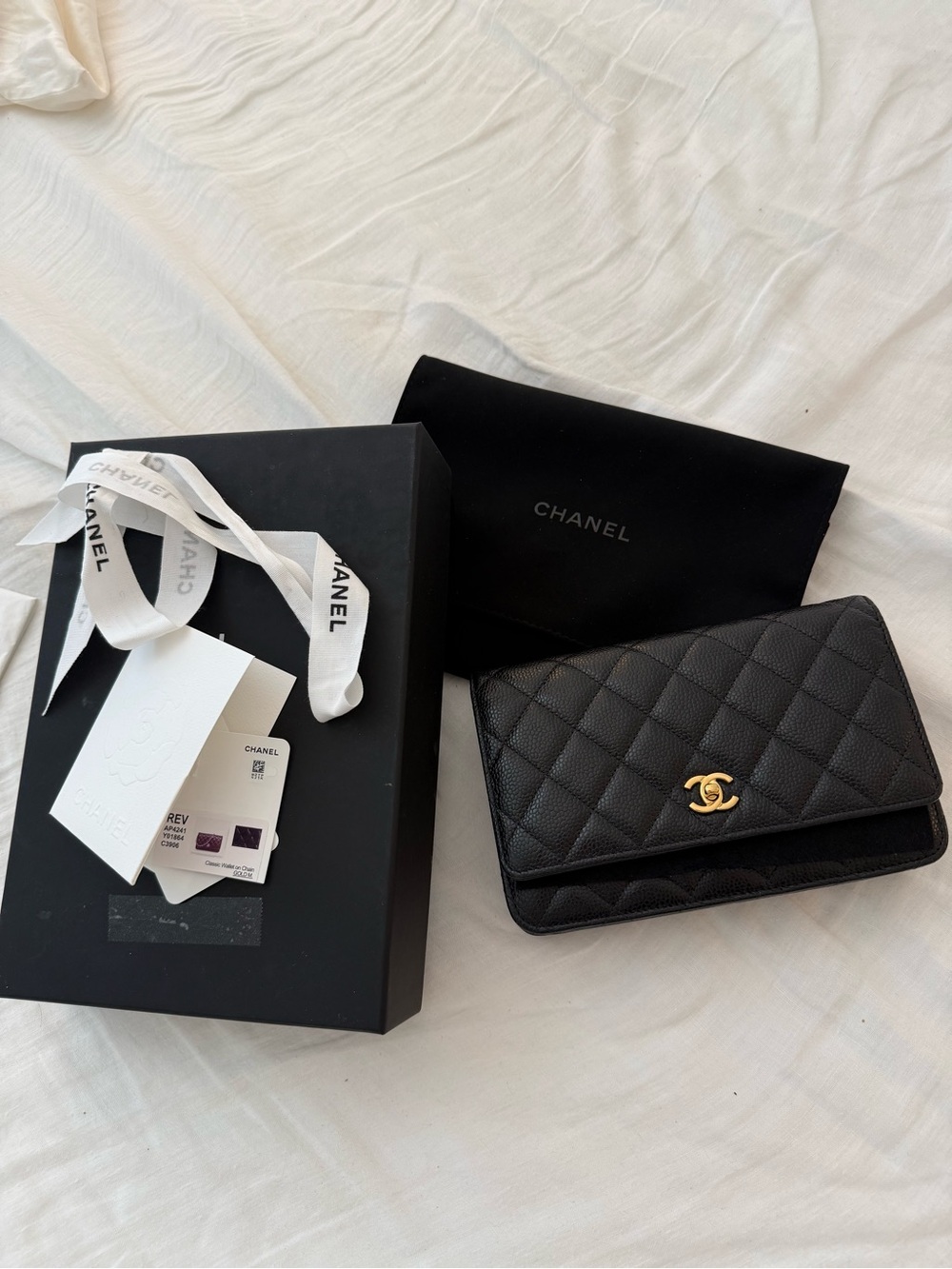 CHANEL Black Quilted Caviar Leather Wallet with Gold CC Turn Lock